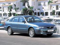 Mazda 626 V (GF) - 1997 по 2002 Хэтчбек 5дв.